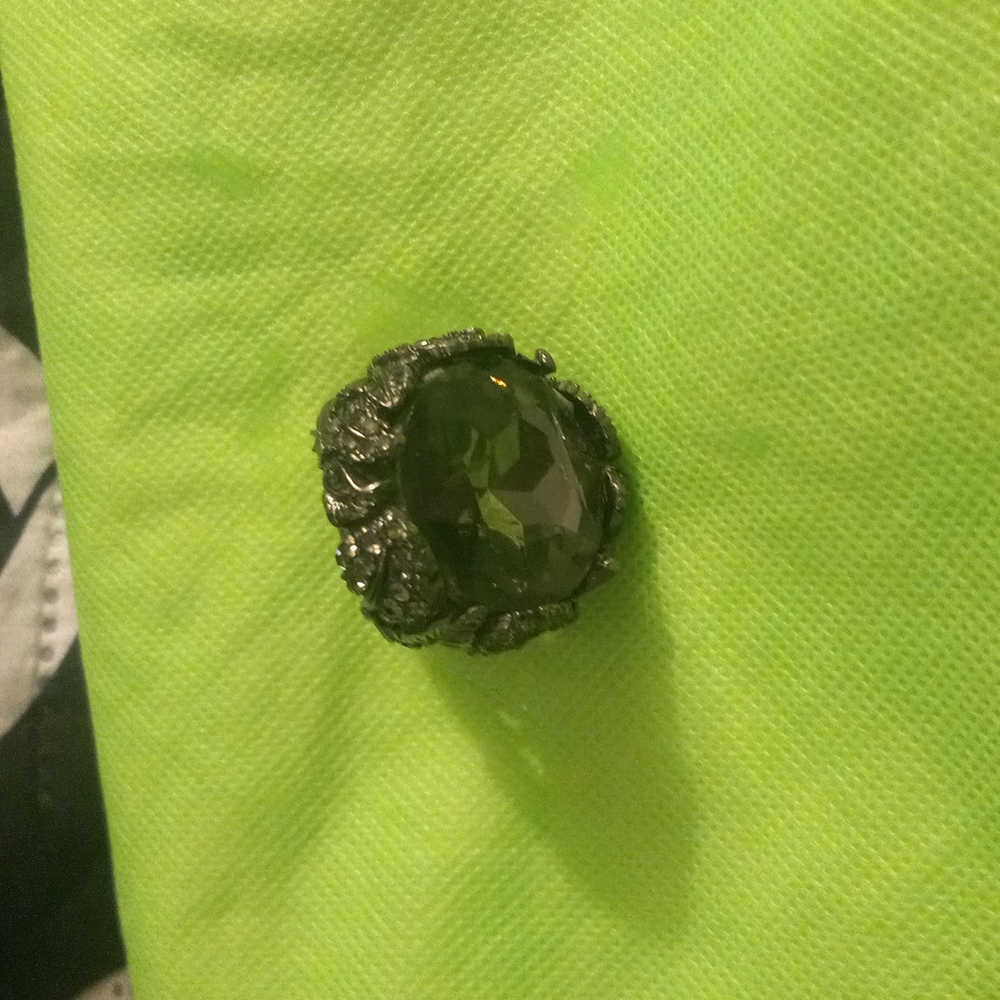Multi faceted cocktail ring